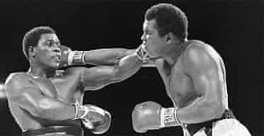 Trevor Berbick, left, and Muhammad Ali seem to have an equal reach as they slug it out during a Friday night boxing match on Dec. 12, 1981 in Nassau, Bahamas