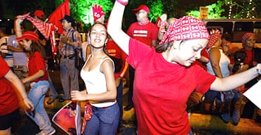Supporters of Hugo Ch&aacute;vez celebrate his victory in the streets of Caracas