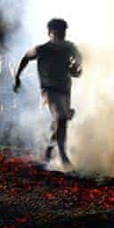 A man walking on hot coals