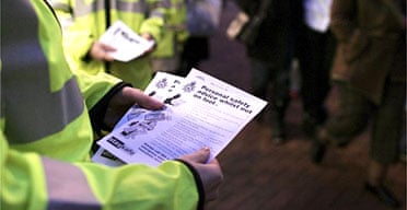 Staff at a community safety unit in Ipswich hand out leaflets