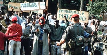 Hutus celebrate the arrival of French troops in June 1994 as part of Operation Turquoise