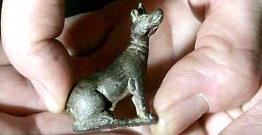 A Roman copper-alloy figurine of a hound, found by Alan Rowe as he used a metal detector on the Isle of Wight, is displayed at the British Museum in London. Photograph: Kirsty Wigglesworth/AP