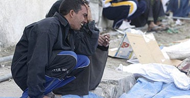 An Iraqi man mourns the death of relative who was killed in a car bomb explosion in Baghdad.