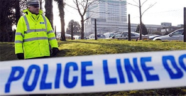Police outside the DVLA centre in Swansea, which received a parcel bomb
