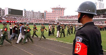 Police parade prisoners awaiting execution at rally in south-western China