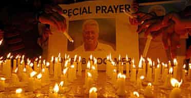Cricket fans in Multan light candles during a prayer ceremony for the late Pakistan cricket coach, Bob Woolmer.