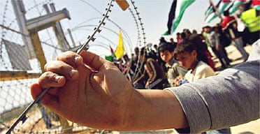 Palestinians protesting at an Israeli barrier in Ras Attiya in the West Bank