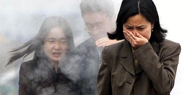 Chinese executives walk through fumes in Beijing