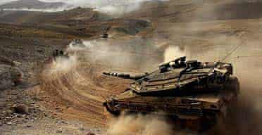 An Israeli tank takes part in a military exercise