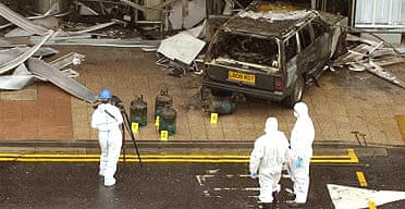 Forensic officers at the scene of Saturday's attack on the terminal building at Glasgow Airport