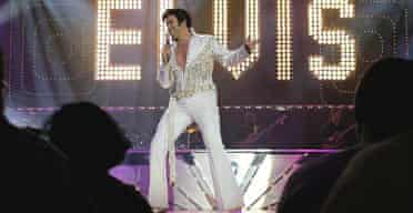 Elvis impersonator Matt Lewis performs during the Legends in Concert show at the Imperial hotel and casino in Las Vegas.