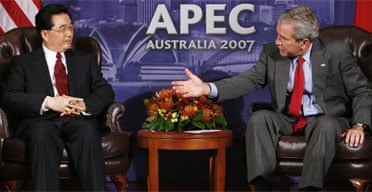 Hu Jintao and George Bush at the Apec summit in Sydney. Photograph: Charles Dharapak/AP