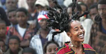 A member of the Circuscopia street theatre troupe performs in the streets of Addis Abeba as part of Ethiopia's millennium celebrations