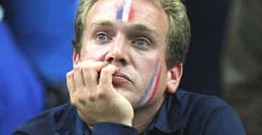 A French fan contemplates France's defeat against Argentina in the opening match of the 2007 Rugby World Cup