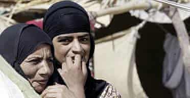  Iraqi Shiite women are seen in a camp outside of Najaf, 160 kilometers (100 miles) south of Baghdad, Iraq.