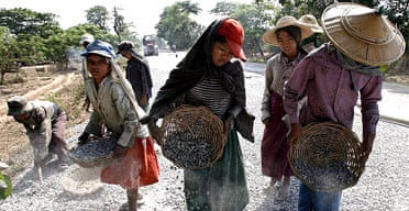 Burmese child labourers repair a road near Nay Pyi Taw