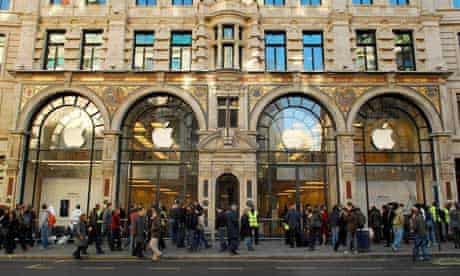 A crowd gathers outside the Regent Street Apple store in London in anticipation of the iPhone going on sale