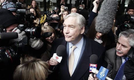 Former newspaper baron Conrad Black leaves the federal building in Chicago after sentencing in his racketeering and fraud trial