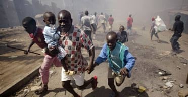 A man and his children flee violence in Nairobi