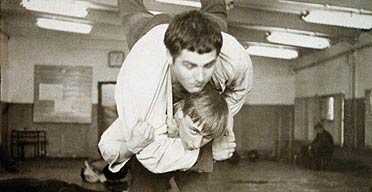 A young Vladimir Putin (below) during a training fight with fellow pupil Vassily Shestakov at a St Petersburg sports school's judo class in 1971