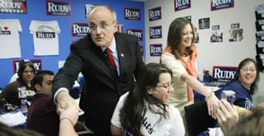 Rudy Giuliani, with his wife Judith Nathan, thanks volunteers at his campaign headquarters in Winter Park, Florida. Photograph: Gerald Herbert/AP