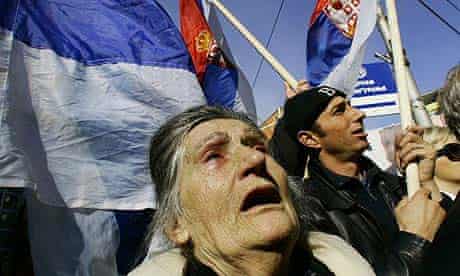 A Kosovo Serb woman cries as she attends a rally against the independence of Kosovo in the town of Mitrovica, Kosovo
