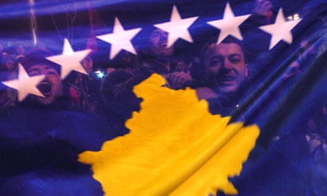 Kosovans celebrate with their new flag