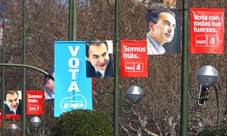 Election posters hang from streetlamps in the centre of Madrid