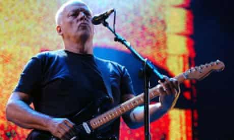 Dave Gilmour of Pink Floyd performing on stage