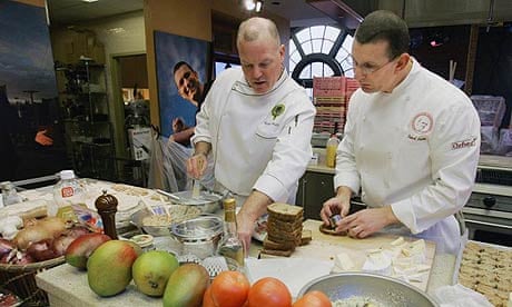 Chef Robert Irvine, right, of the Food Network's show Dinner: Impossible, and one of his sous chefs work in one of the network's kitchens in New York