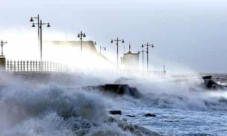 Waves lash the seafront at Porthcawl, Wales