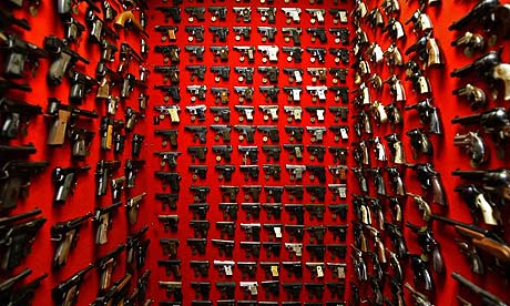 Guns line the walls of the firearms reference collection at the Washington Metropolitan police department headquarters in Washington