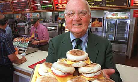 Herb Peterson, the creator of the Egg McMuffin, shows off his invention in this April 1997 file photo, at one of his McDonald's franchises in Santa Barbara, California.