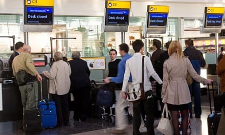 Passengers queue in Terminal 5, Heathrow.