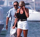 Diana, Princess of Wales, right, and her companion Dodi Fayed, walk on a pontoon in St. Tropez in this August 1997 file photo.