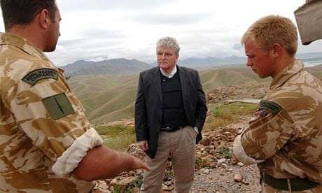 Defence secretary Des Browne speaks to troops at a dam reconstruction site in Helmand province, Afghanistan