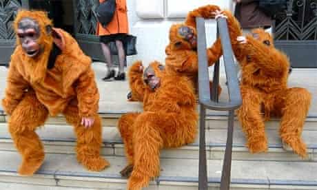 Greenpeace protesters dressed as orangutans demonstrate outside Unilever's central London headquarters