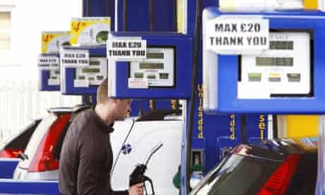 Customers filling up at a petrol station in Linlithgow