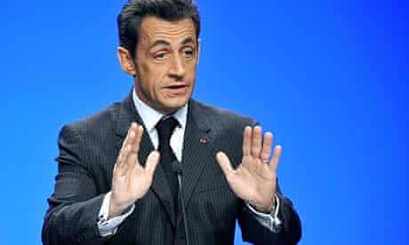 French president Nicolas Sarkozy gestures as he speaks in Neufchateau, eastern France