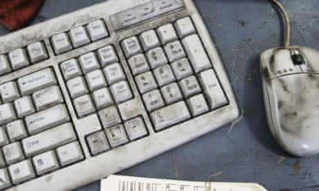 A dirty computer keyboard and mouse
