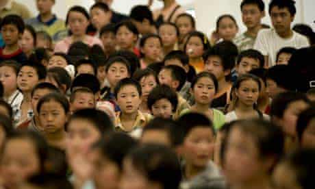 Children who survived the earthquake attend lessons in Sichuan province