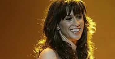 Alanis Morissette performs on stage in London