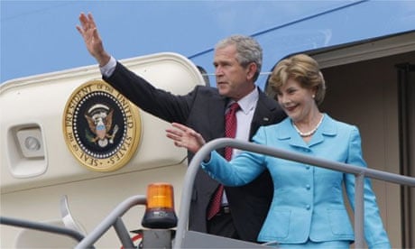 George Bush and Laura Bush wave from Air Force One after landing at Heathrow