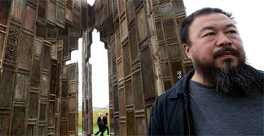  Chinese artist Ai Weiwei poses in front of his installation "Template"