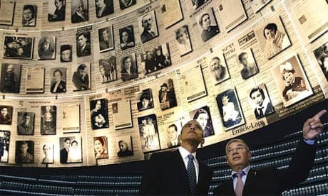 Barack Obama is escorted through the hall of names at the Yad Vashem Holocaust history museum in Jerusalem