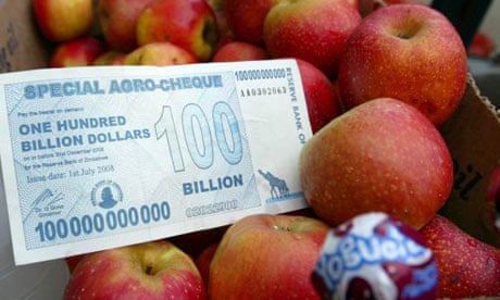 A new 100 billion Zimbabwean dollar note in a box of apples in Harare
