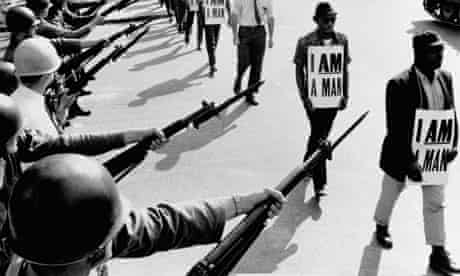 Civil Rights activists are blocked by National Guardsmen brandishing bayonets while trying to stage a protest on Beale Street in Memphis, Tennessee. March 19, 1968, Memphis, Tennessee, USA.