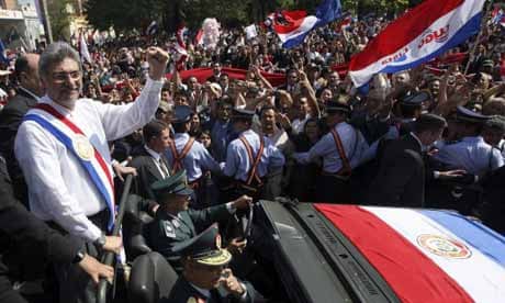 Paraguay's president Fernando Lugo greets the crowd after his swearing-in ceremony in Asuncion. Photograph: Ivan Alvarado/Reuters