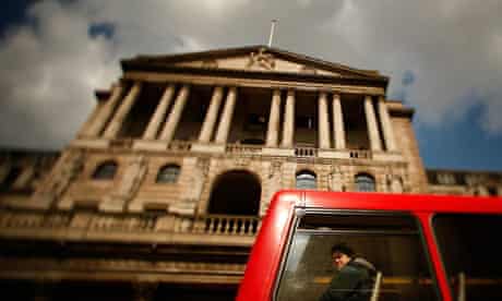 A bus passes by the Bank of England