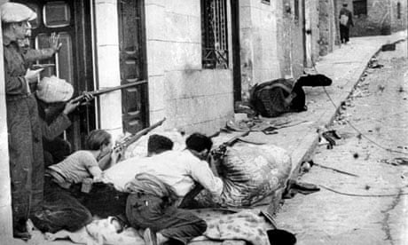 Republicans fighting in a Spanish village in the late 1930s. Photograph: AFP/Getty Images